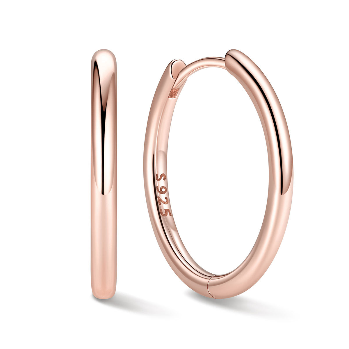 16mm Rose gold huggie earrings on a white background