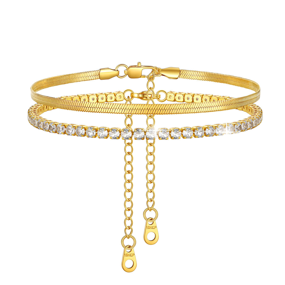 Gold anklet bracelet with chain and clear stones on a white background