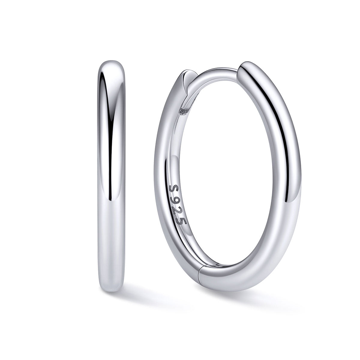 12mm Silver huggie earrings on a white background
