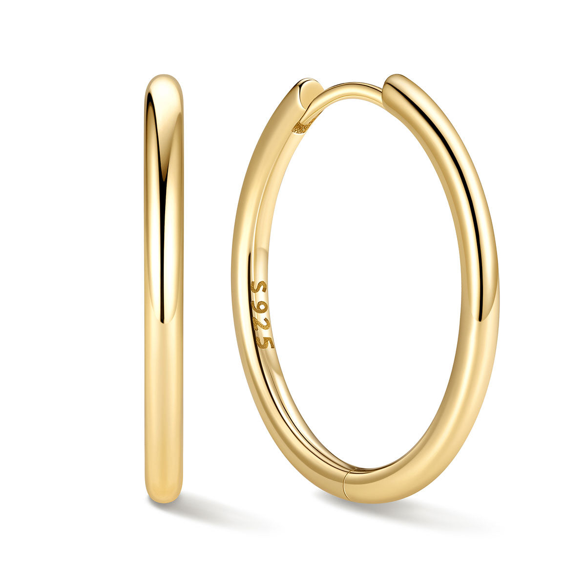 18mm Gold huggie earrings on a white background