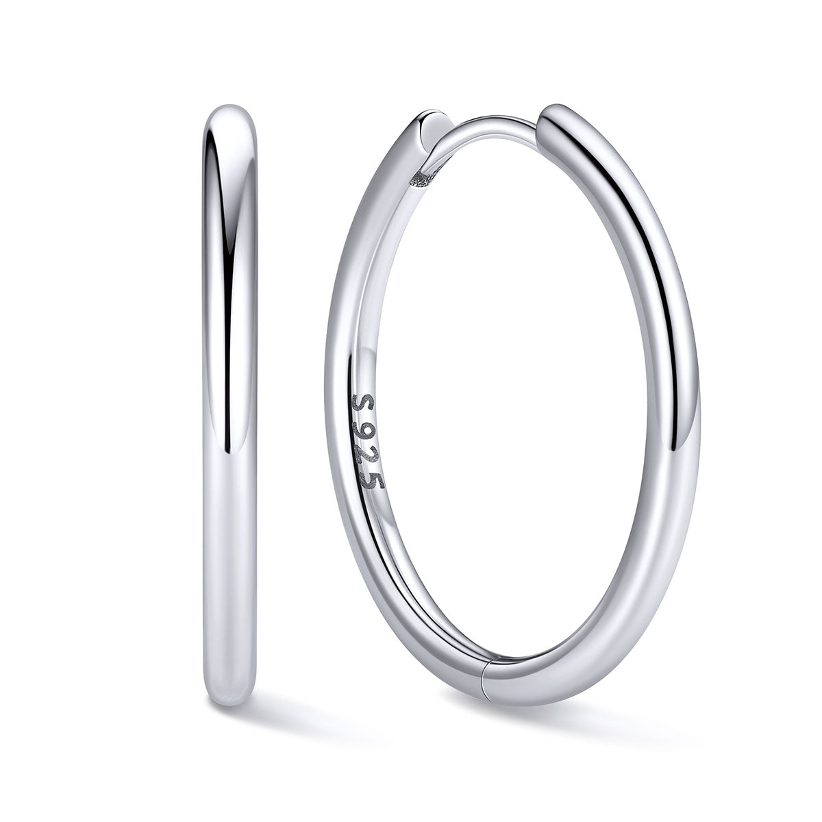 18mm Silver huggie earrings on a white background