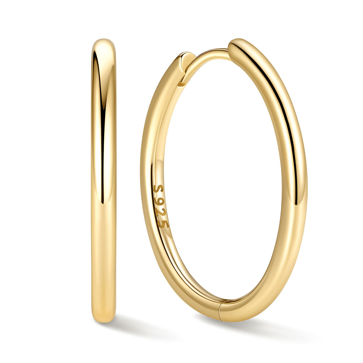 20mm Gold huggie earrings on a white background