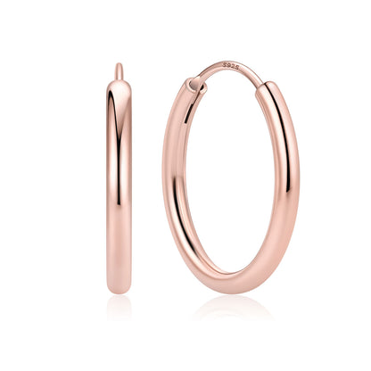 20mm Rose gold hoop earrings on a white background