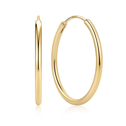 30mm Gold plated hoop earrings on a white background