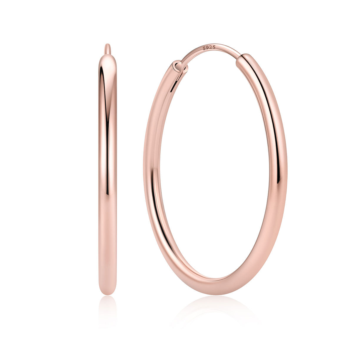 30mm Rose gold hoop earrings on a white background