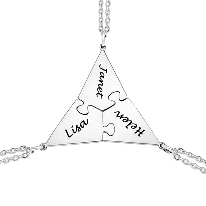 3PCS silver puzzle necklace with interlocking puzzle pieces engraved with names on a white background