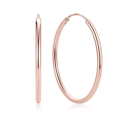 40mm Rose gold hoop earrings on a white background