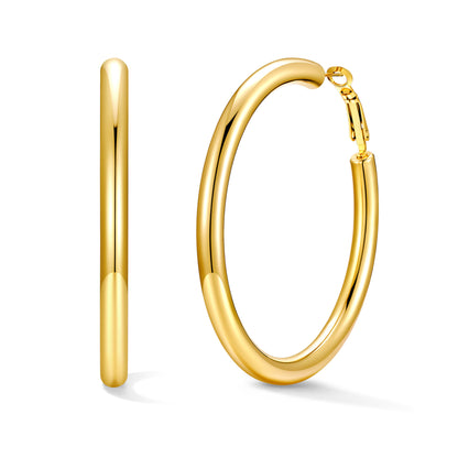 60mm Gold hoop earrings on a white background