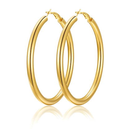 70mm Gold hoop earrings on a white background