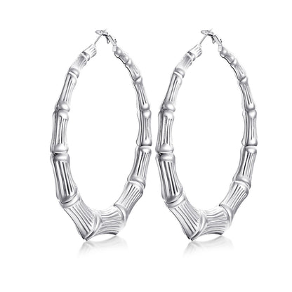 80mm Silver bamboo hoop earrings with bamboo design on a white background