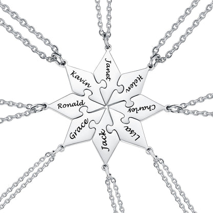 8PCS silver puzzle necklace with interlocking puzzle pieces engraved with names on a white background