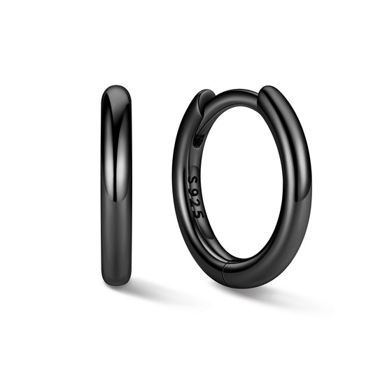 8mm Black huggie earrings on a white background