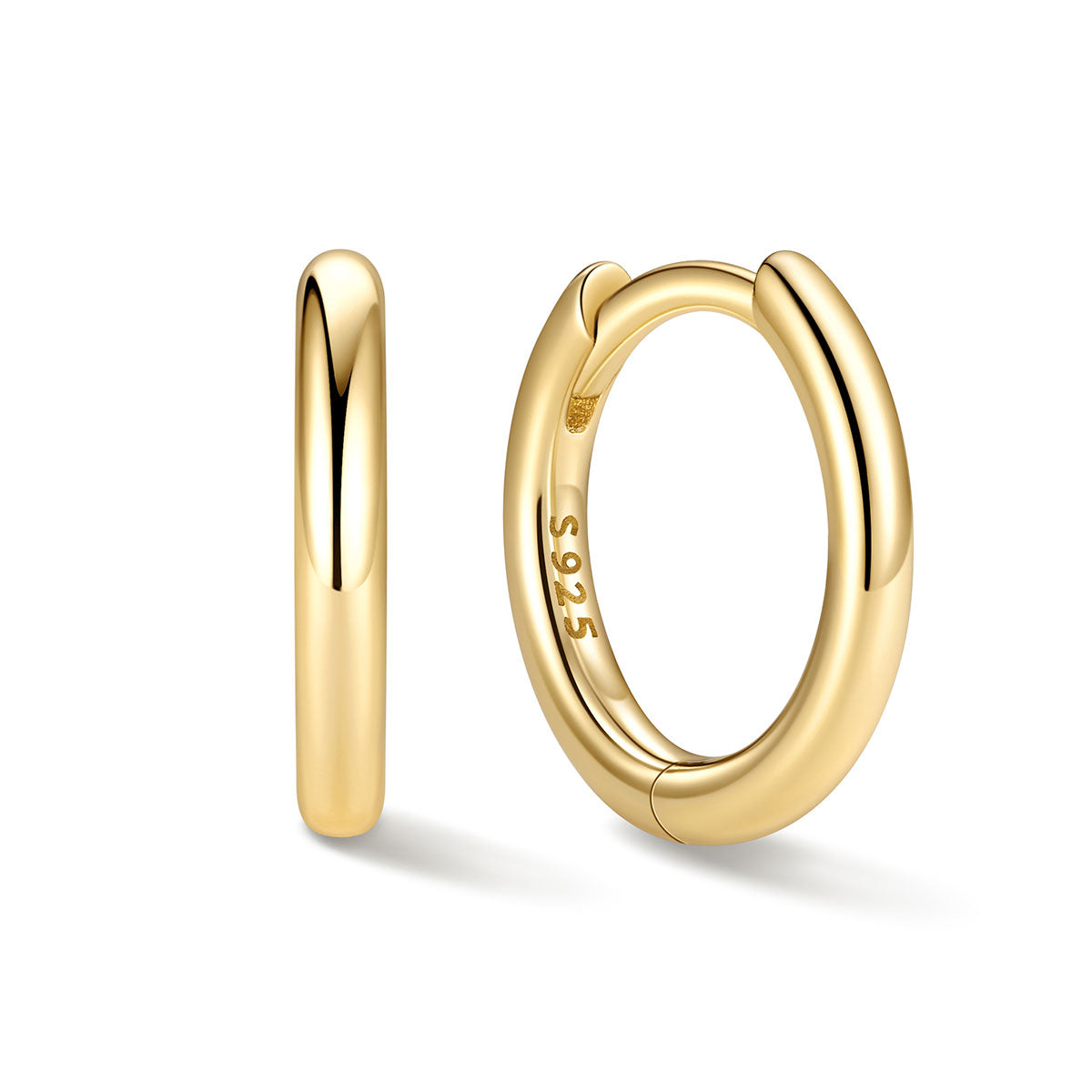 8mm Gold huggie earrings on a white background