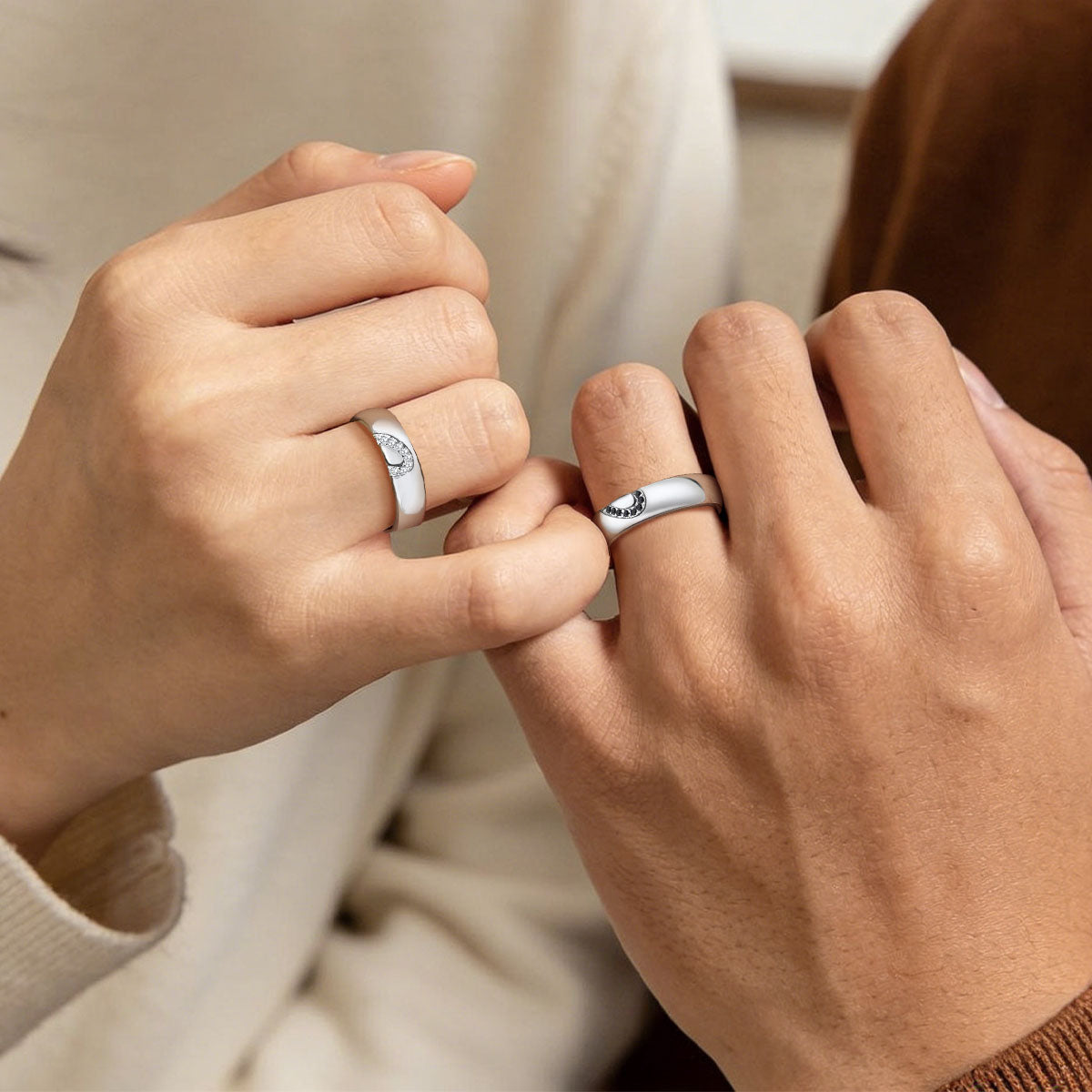 A Couple Wearing Custom Heart Matching Moissanite Promise Rings