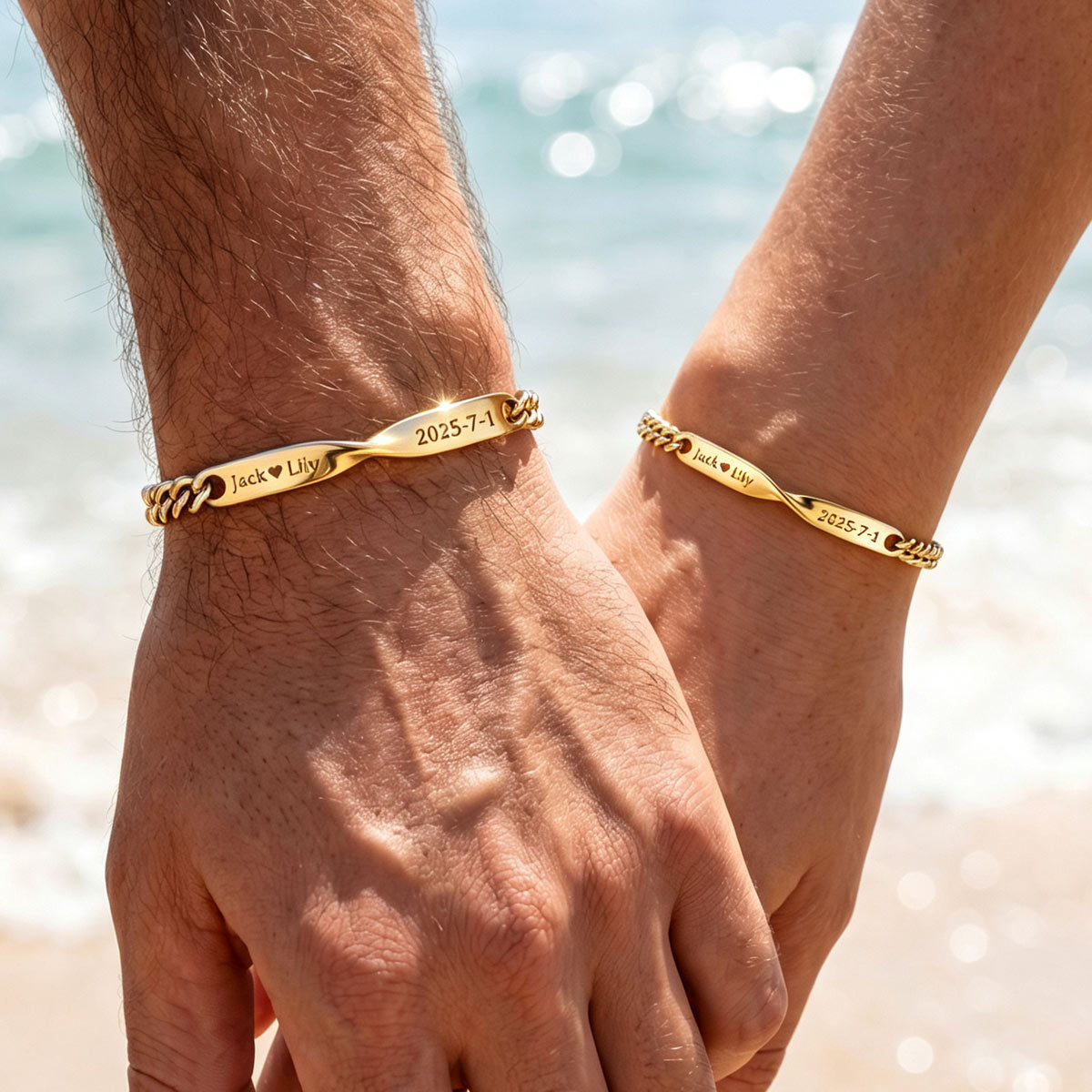 A Couple Wearing Gold Plated Personalized Name Mobius Matching Bracelets for Couples