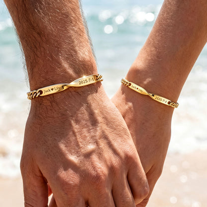 A Couple Wearing Gold Plated Personalized Name Mobius Matching Bracelets for Couples