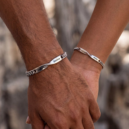 A Couple Wearing Personalized Name Mobius Matching Bracelets for Couples