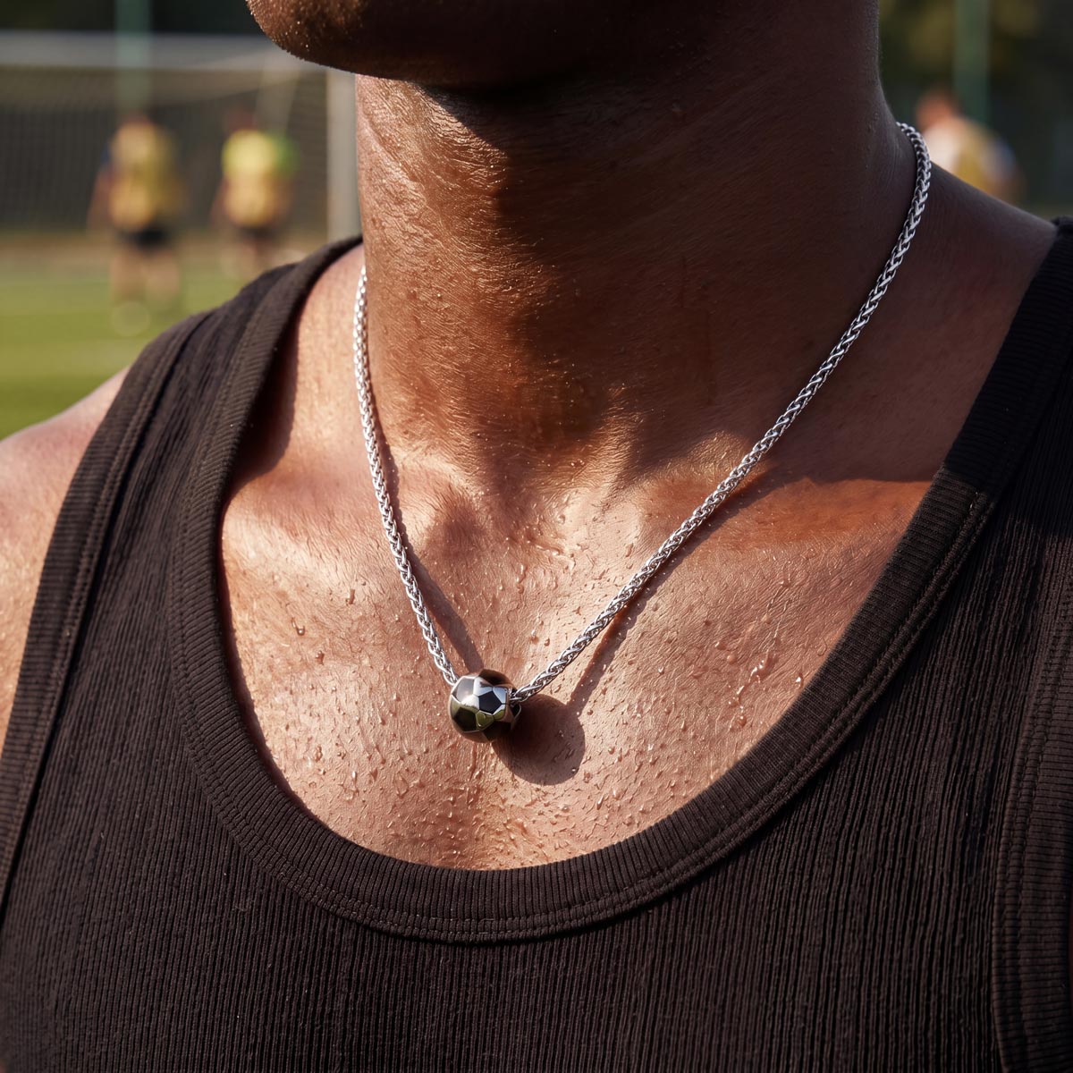 A Man Wearing 316L Stainless Steel 3D Soccer Necklaces Sport Necklaces