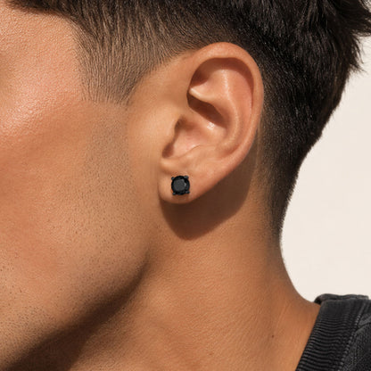 A Man Wearing 925 Sterling Silver Black CZ Stud Earrings 