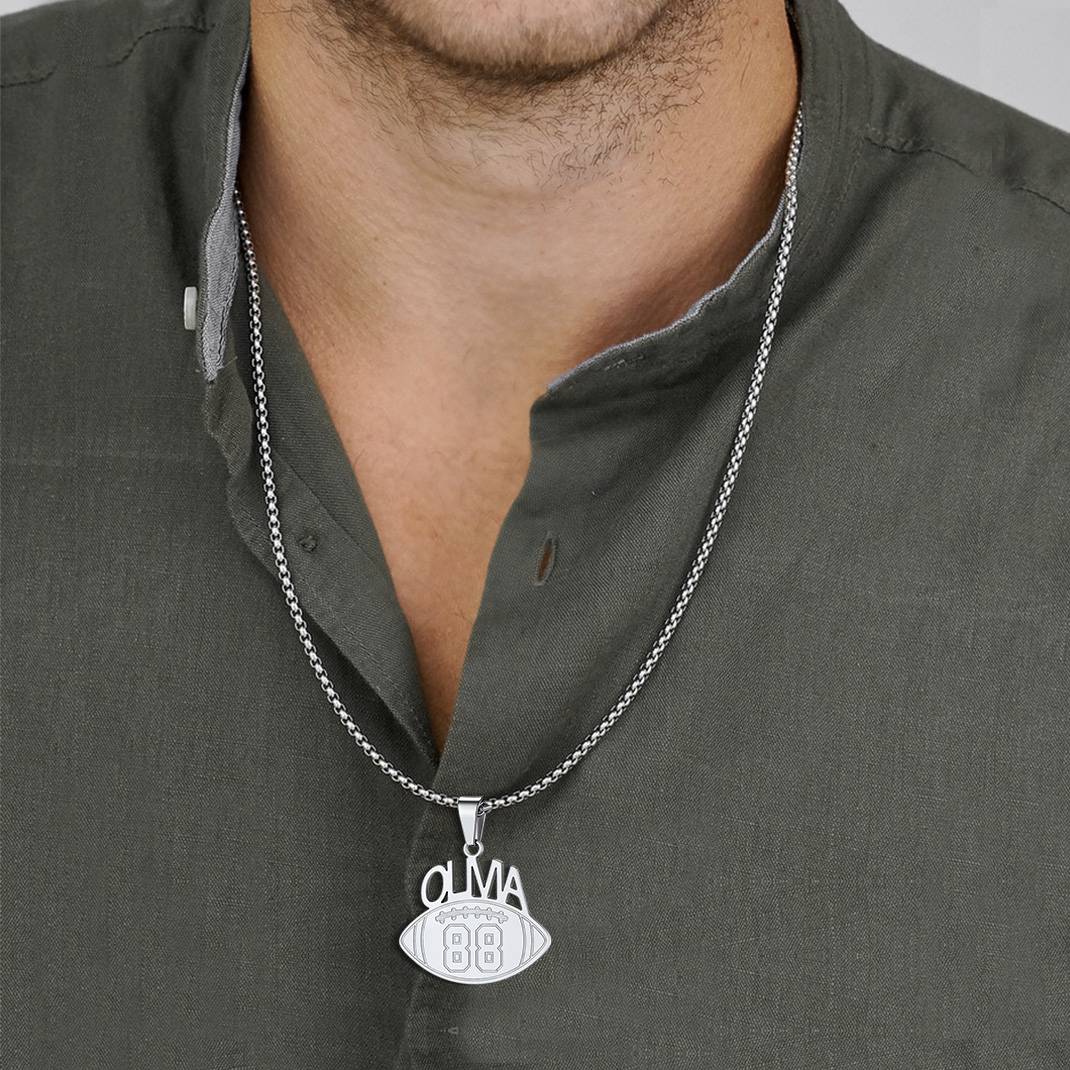 A Man Wearing Ball Sport Necklaces with Jersey Number