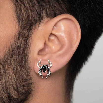 A Man Wearing Black CZ Spider Stud Earrings