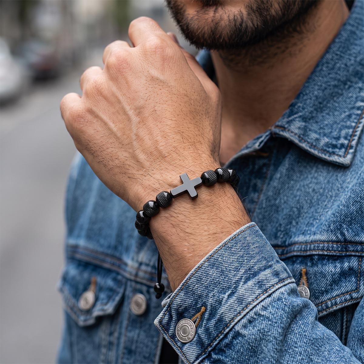 A Man Wearing Black Cross Obsidian Beads Bracelet