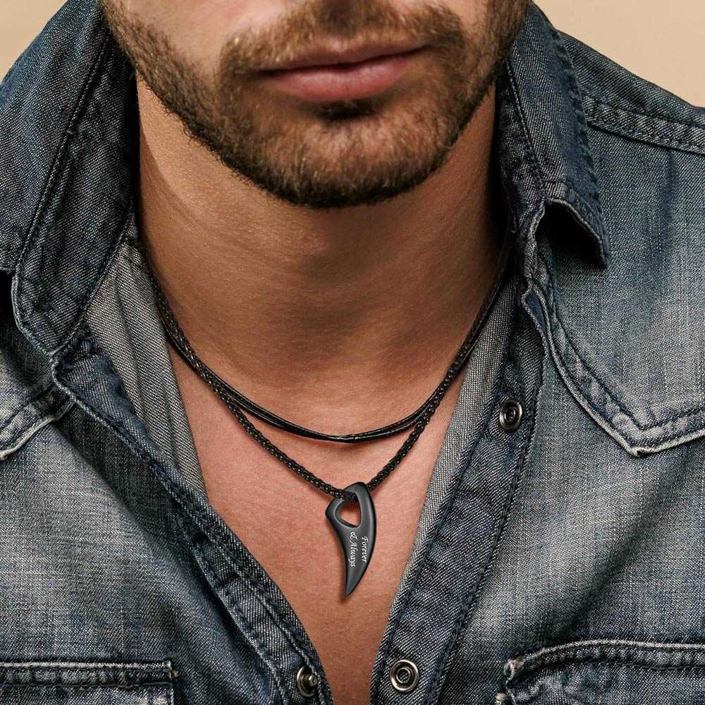 A Man Wearing Black Custom Wolf Tooth Necklace