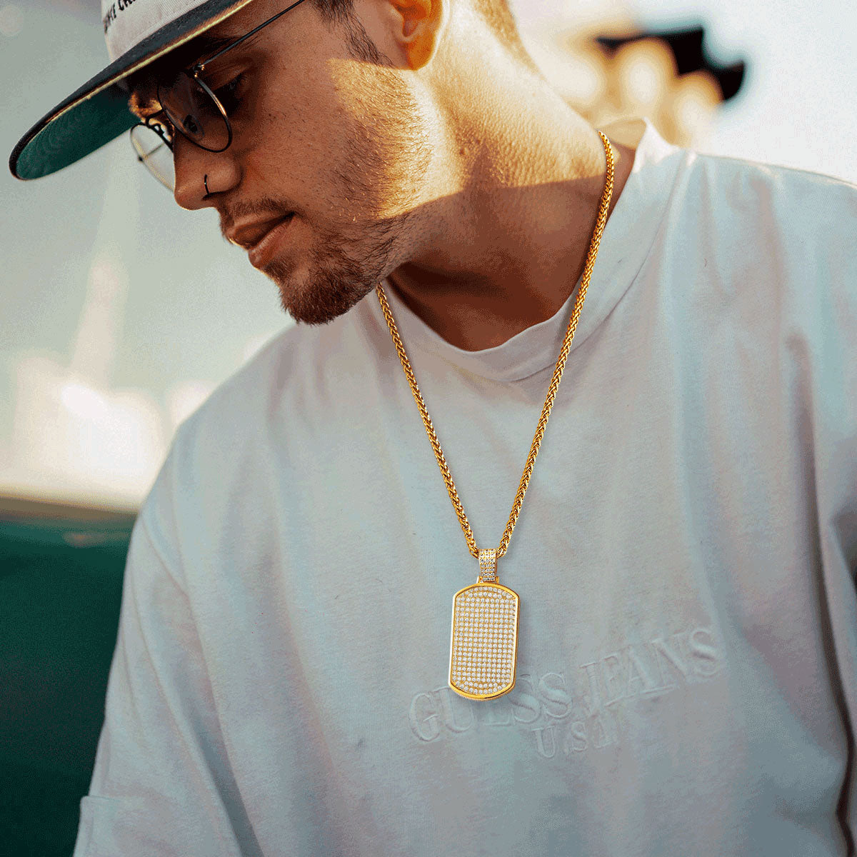 A Man Wearing Bling Cubic Zirconia Dog Tag Necklaces