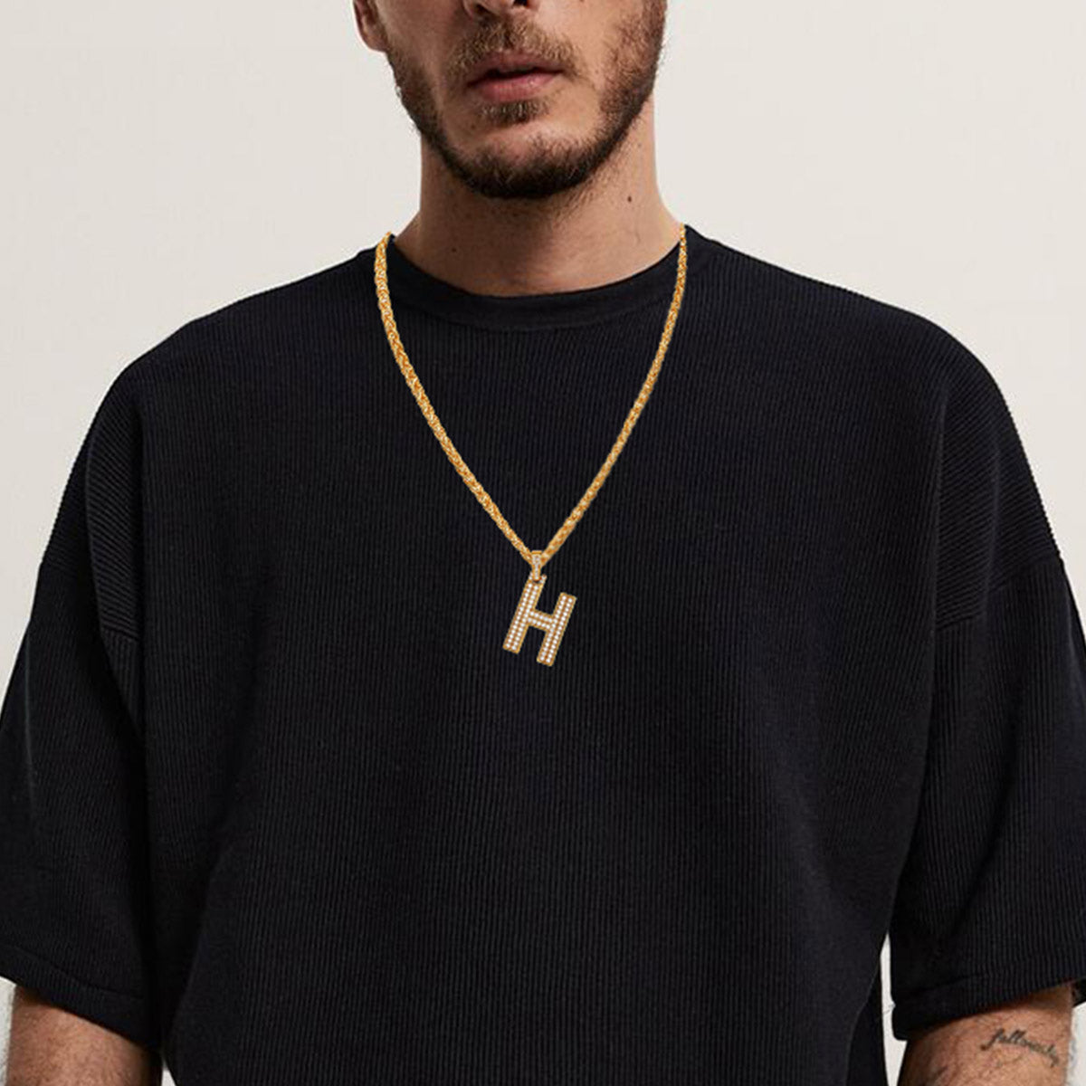 A  Man Wearing Bling Cubic Zirconia Initial A-Z Necklace