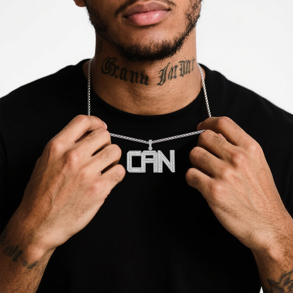 A Man Wearing Bling Cubic Zirconia Initial Necklace