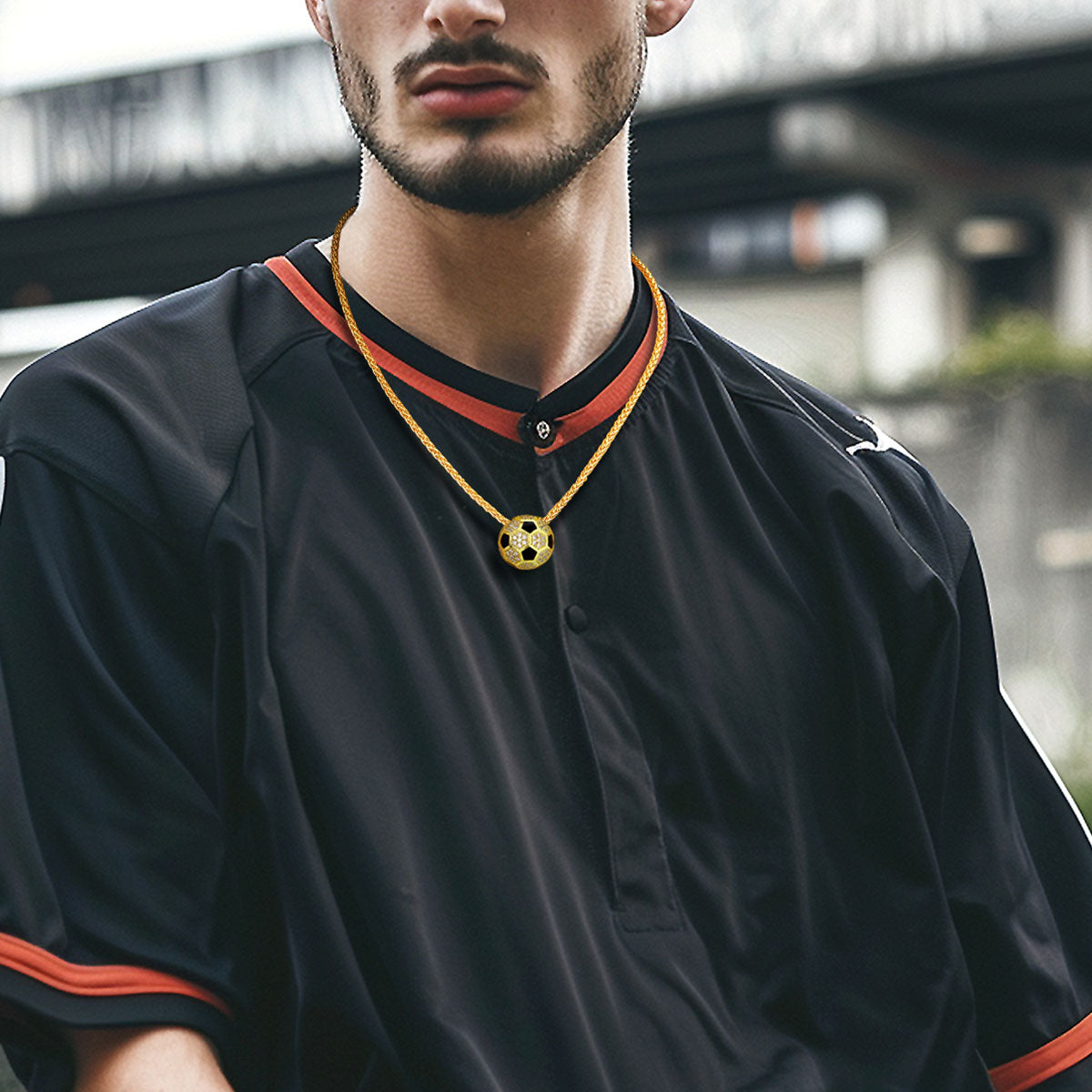 A Man Wearing CZ Gold Soccer Necklaces 