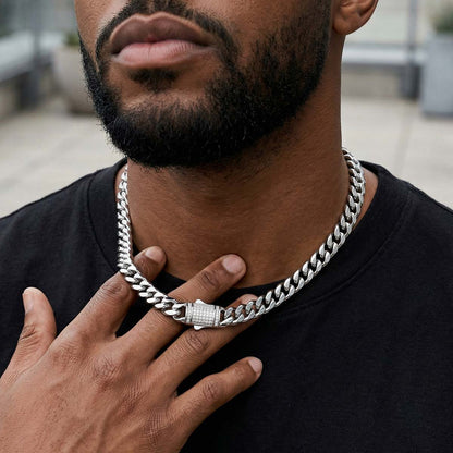 A Man Wearing Cuban Link Necklace with Blinged Out Clasp in Stainless Steel 