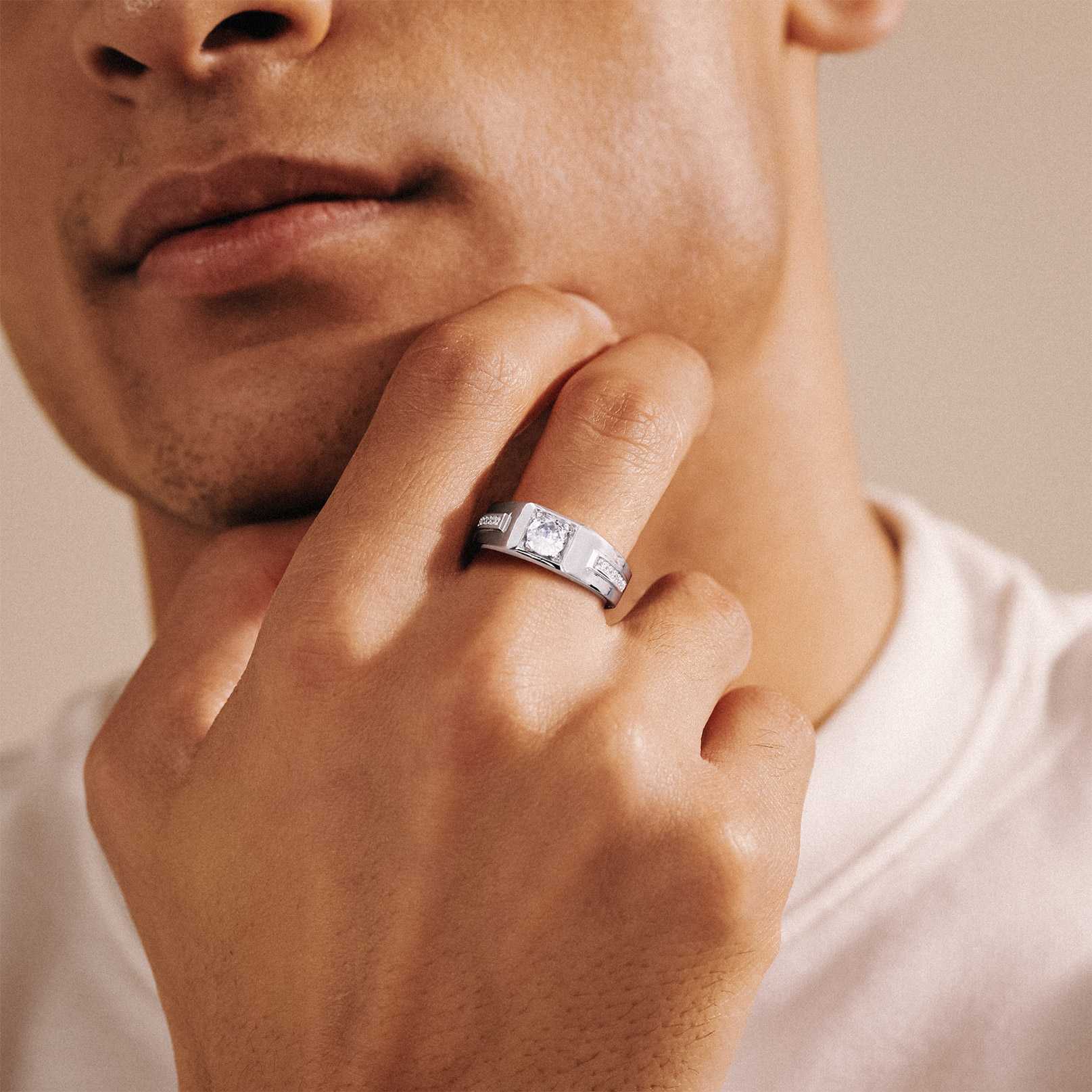 A Man Wearing Cubic Zirconia Promise Rings for Couple