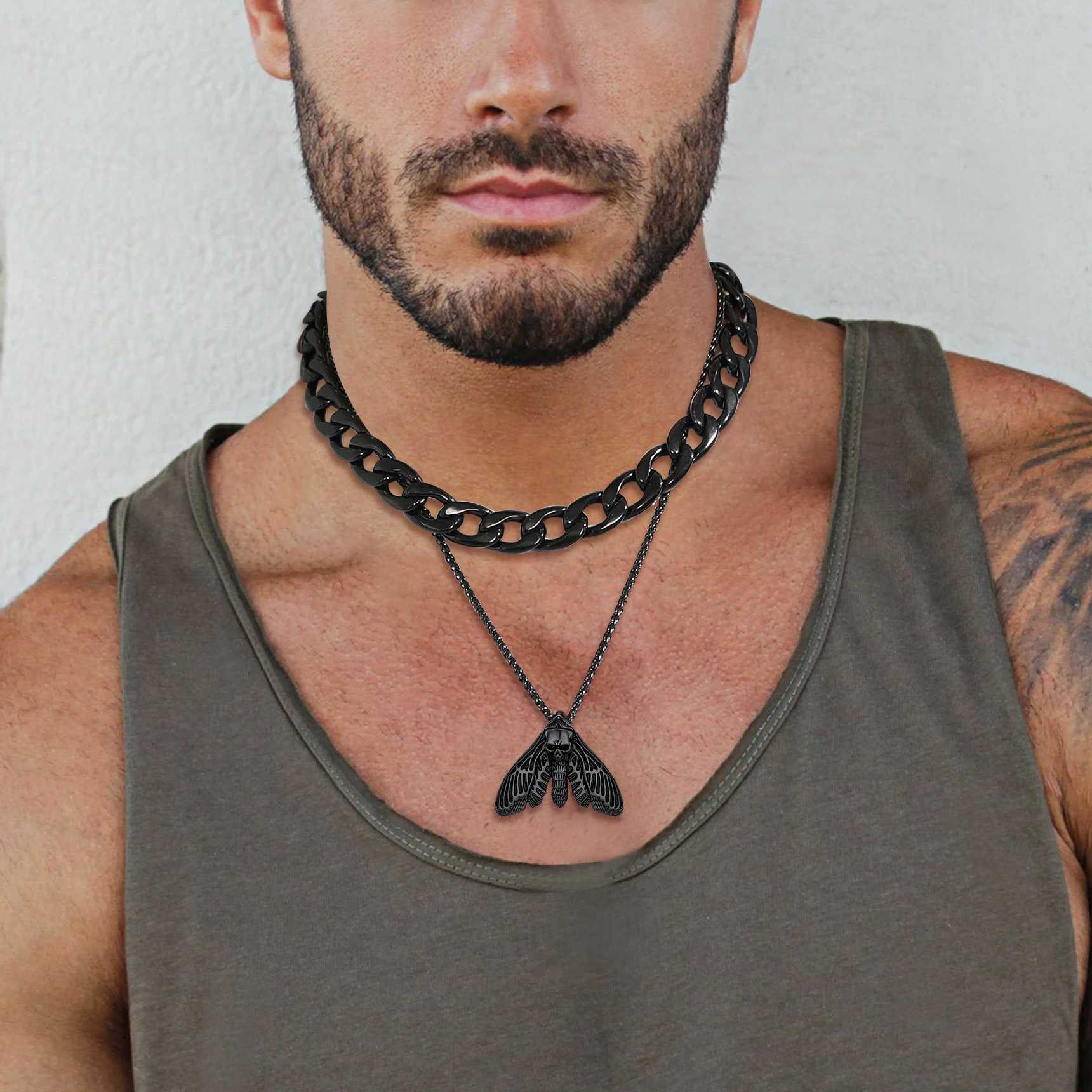 A Man Wearing Custom Death Head Moth Skull Necklace