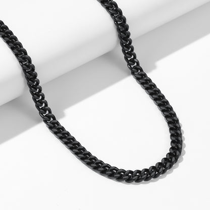 A Man Wearing Custom Engravable Cuban Chain Necklace & Bracelet Set 7MM in Black Plated