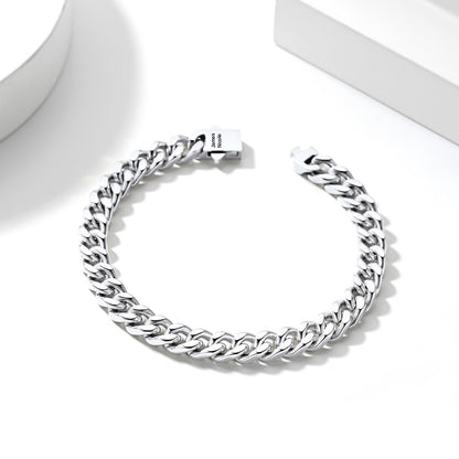 A Man Wearing Custom Engravable Cuban Chain Necklace & Bracelet Set 7MM in Steel