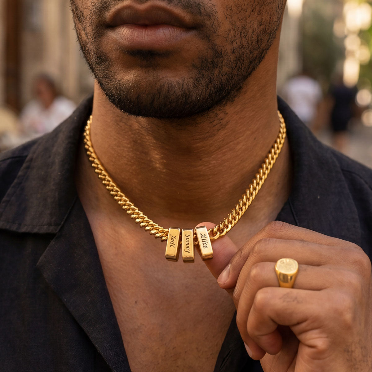 A Man Wearing Custom Engraved Charm Multi Name Cuban Link Necklace Gold Plated