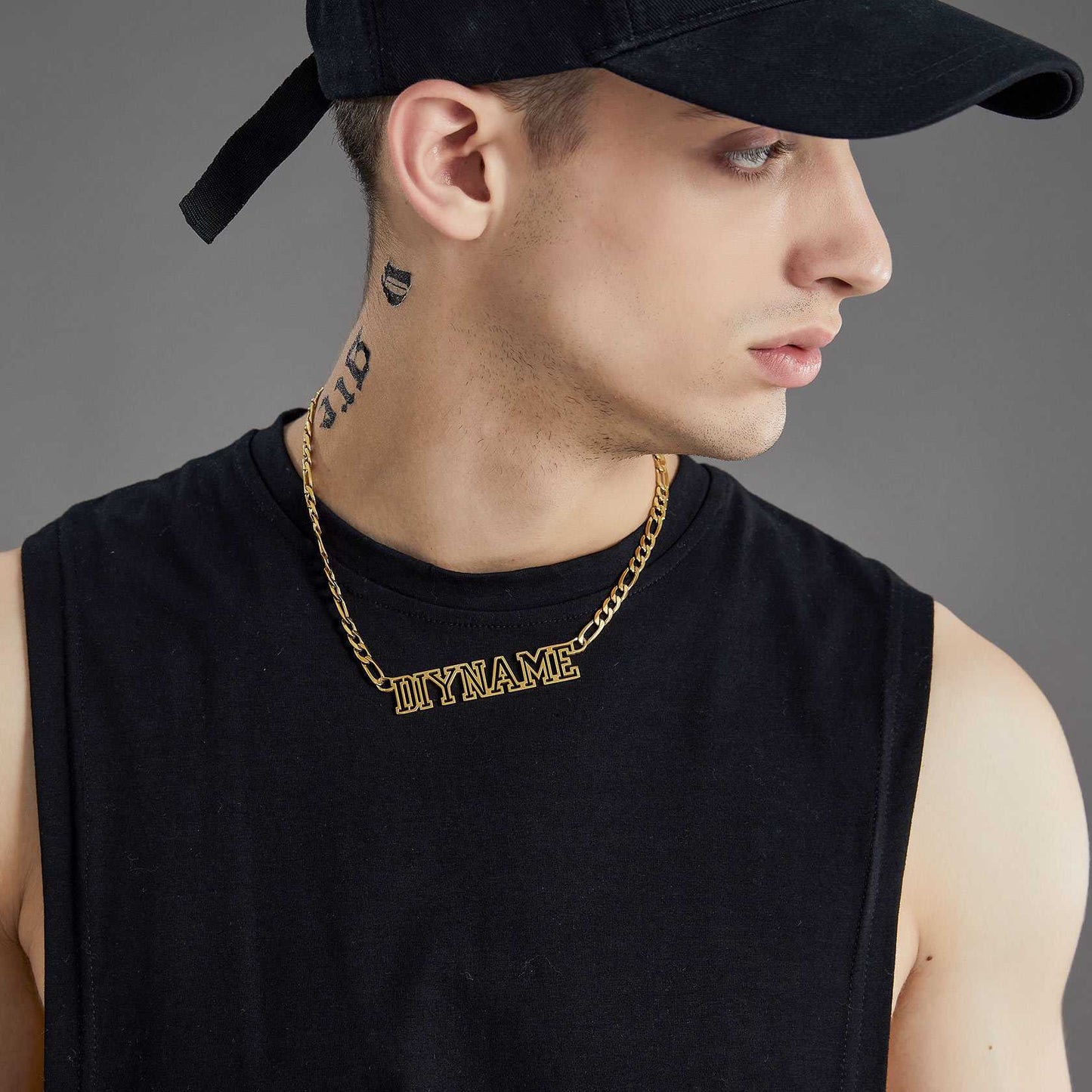 A Man Wearing Custom Figaro Chain Name Plate Necklace