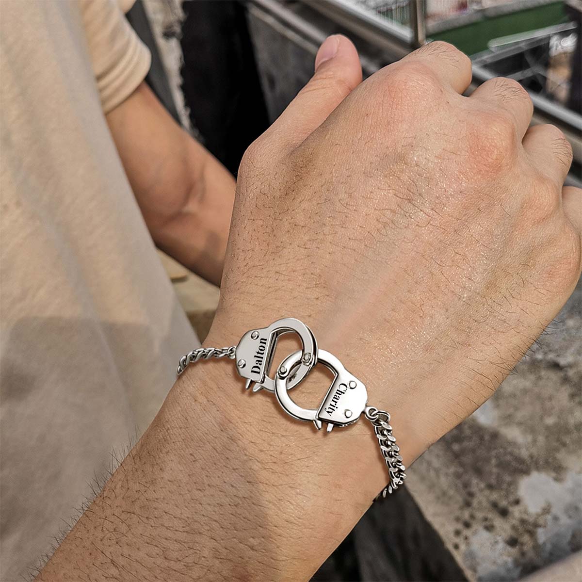 A Man Wearing Custom Handcuff Chain Bracelet