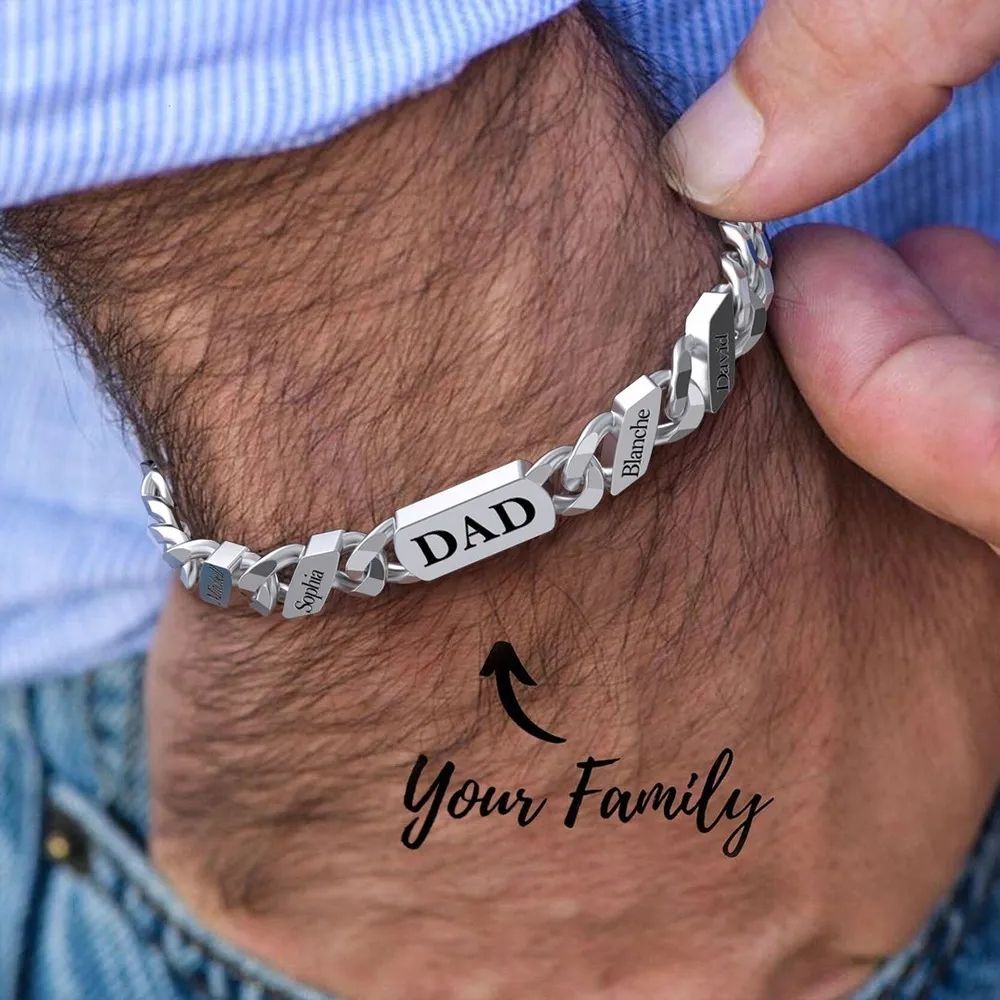 A Man Wearing Names Cuban Chain Bracelet
