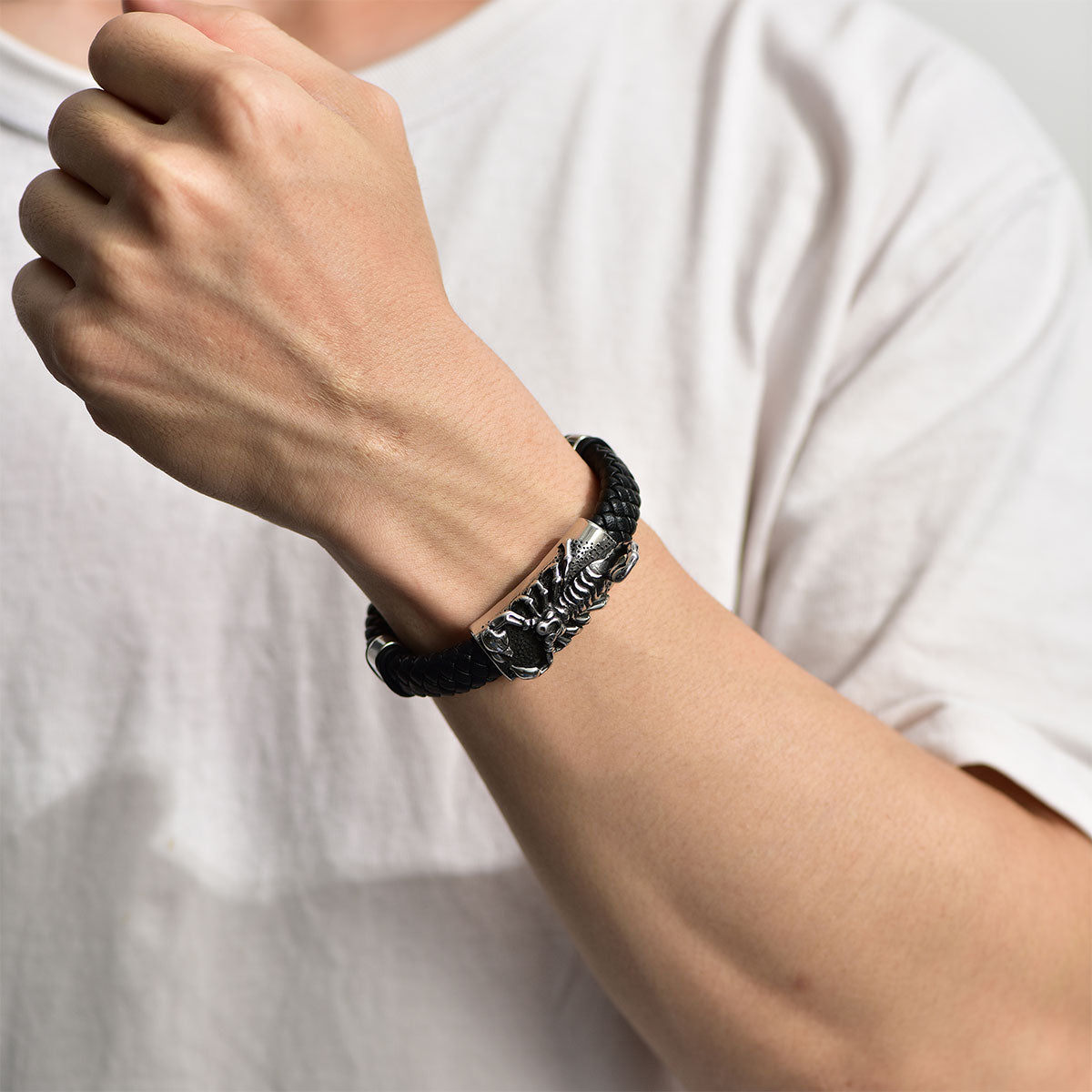A Man Wearing Custom Scorpion Leather Braided Bracelet