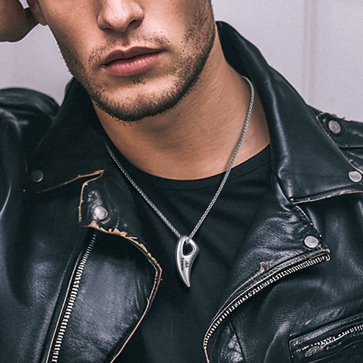 A Man Wearing Custom Wolf Tooth Necklace