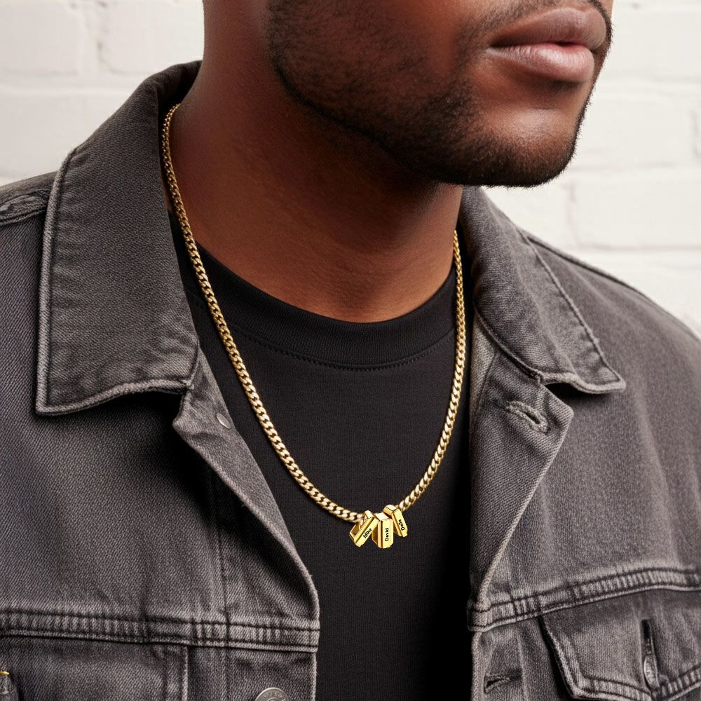 A Man Wearing Engraved Charm Multi Name Necklace