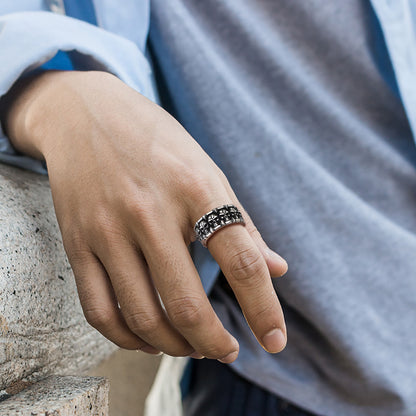A Man Wearing Engraved Gothic Skull Ring