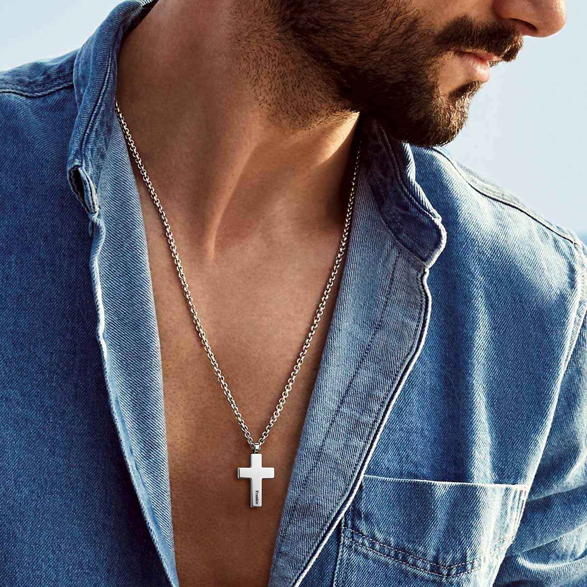 A Man Wearing Engraved Latin Cross Urn Necklaces for Ashes
