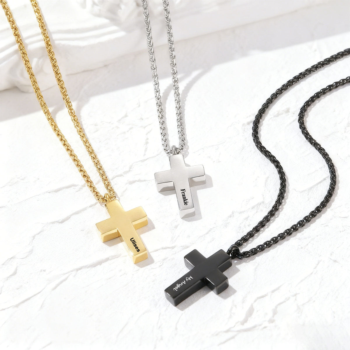 A Man Wearing Engraved Latin Cross Urn Necklaces in different color