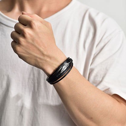 A Man Wearing Feather Leaf Braided Leather Bracelet