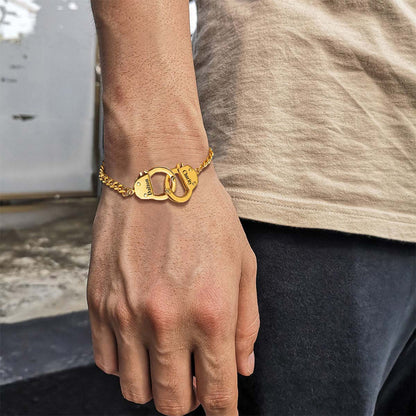 A Man Wearing Gold Custom Handcuff Chain Bracelet