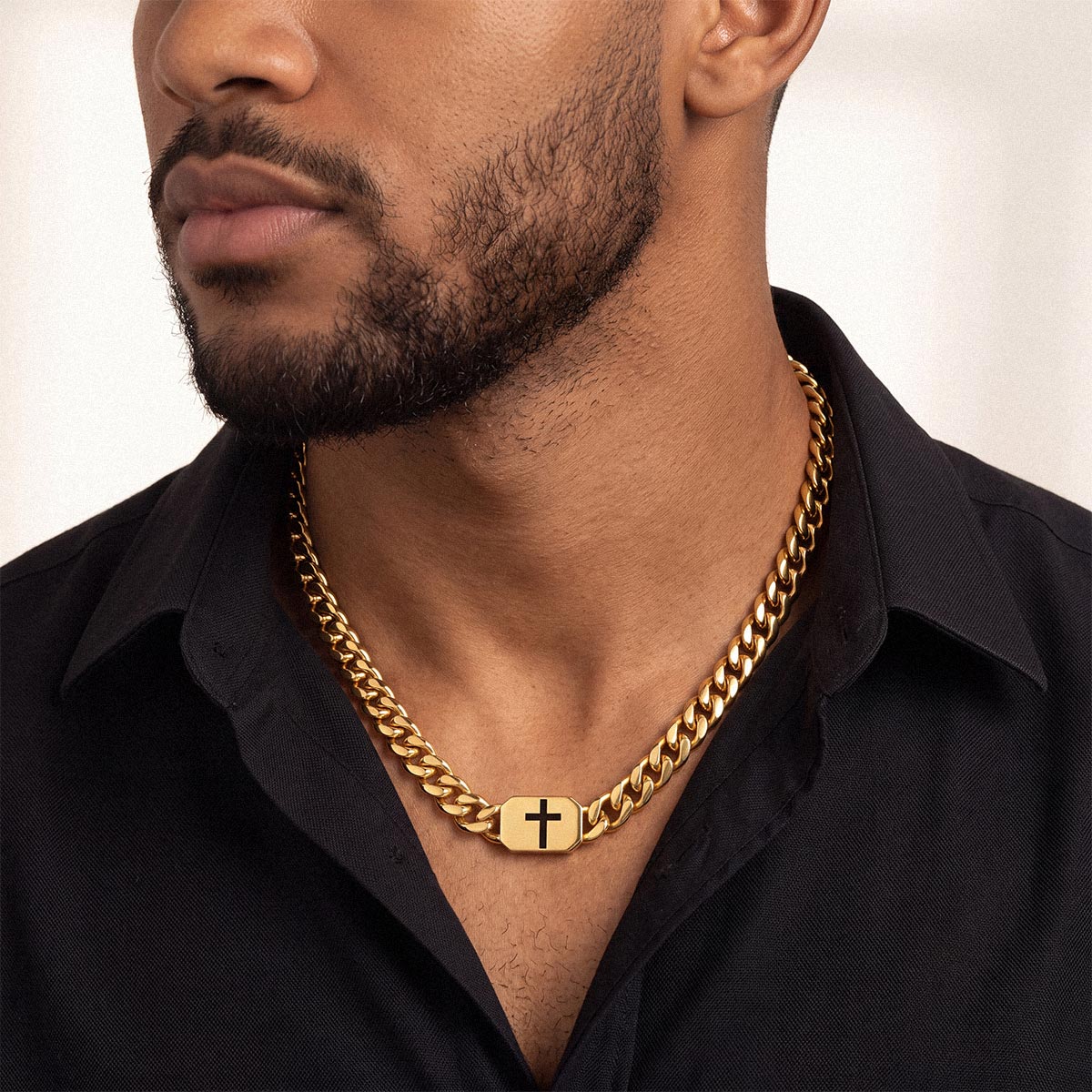 A Man Wearing Gold Plated Custom Cross Cuban Link Chain Necklace in Stainless Steel 