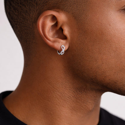 A Man Wearing Infinity Earrings Huggie Hoop Earrings in 925 Sterling Silver